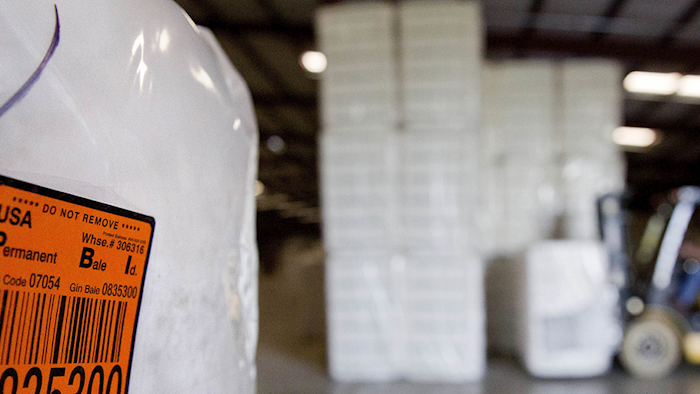 A bale of cotton sits packed and labeled while waiting to be shipped from the South Central Georgia Gin Company in Enigma, Ga.