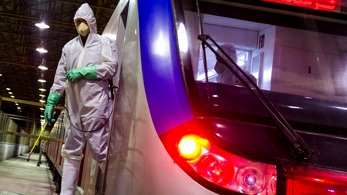 Workers disinfect subway trains against coronavirus in Tehran, Iran, in the early morning of Tuesday, Feb. 25, 2020.
