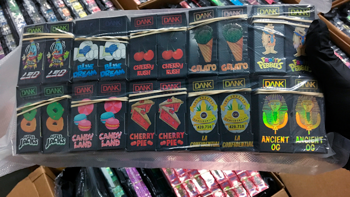 In this Sept. 23, 2019, photo shows 'Dank' packaging, part of the 75,000 THC vaping cartridges seized in a record drug bust in Anoka County, Minn.