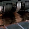 SonicLayer X̅ seam welding in action to produce copper foil onto copper busbar.