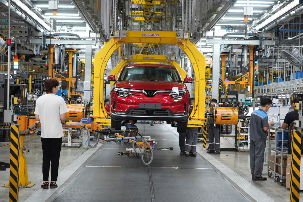 Workers assemble a car at a Vinfast factory in Hai Phong, Vietnam, on Sept. 29, 2023.