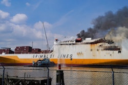 Emergency personnel battle against a fire aboard the Italian-flagged Grande Costa d'Avorio cargo ship at the Port of Newark, Friday, July 7, 2023, in Newark, N.J.