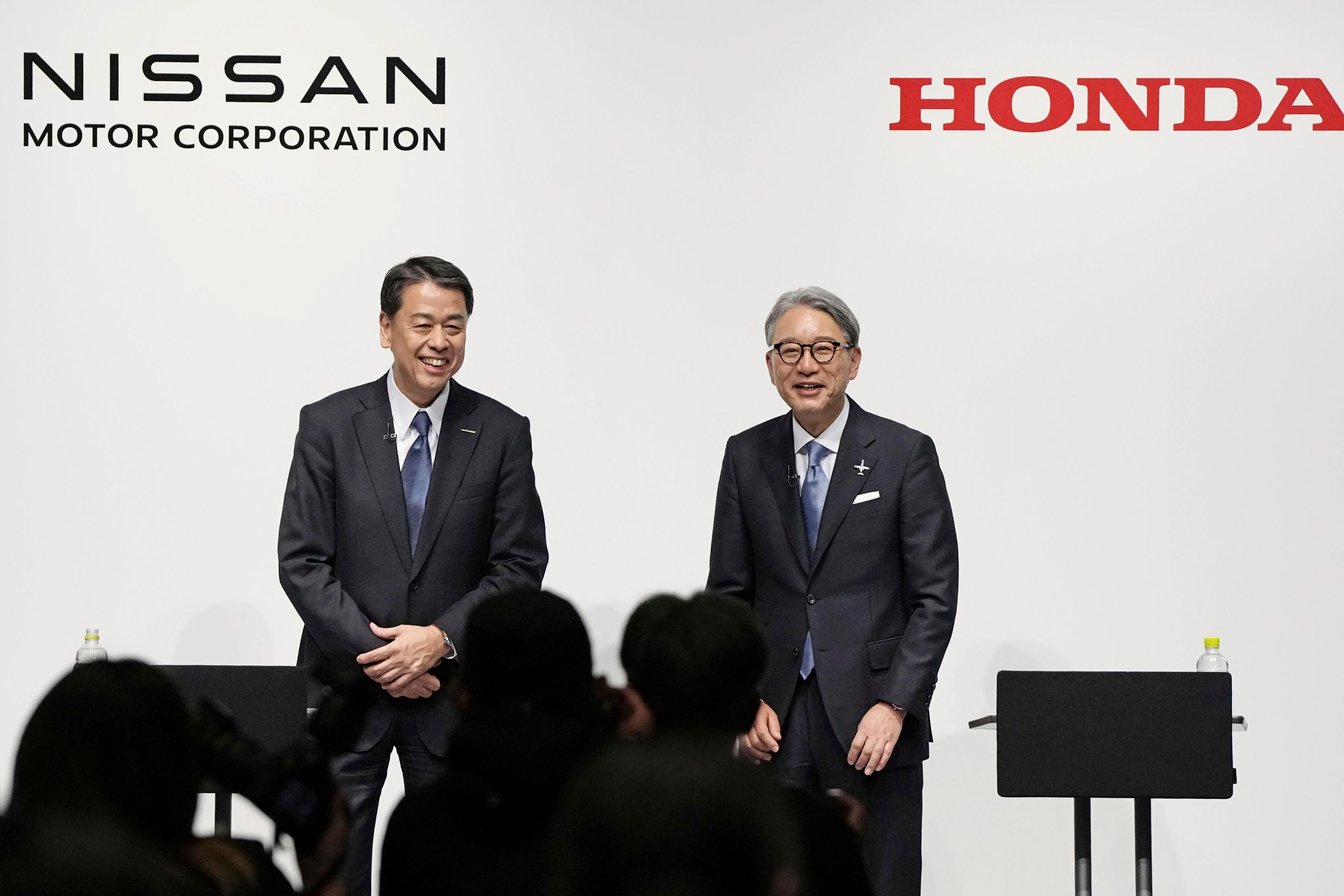 Nissan Chief Executive Makoto Uchida, left, and Honda President Toshihiro Mibe attend a joint news conference in Tokyo, Friday, March 15, 2024.