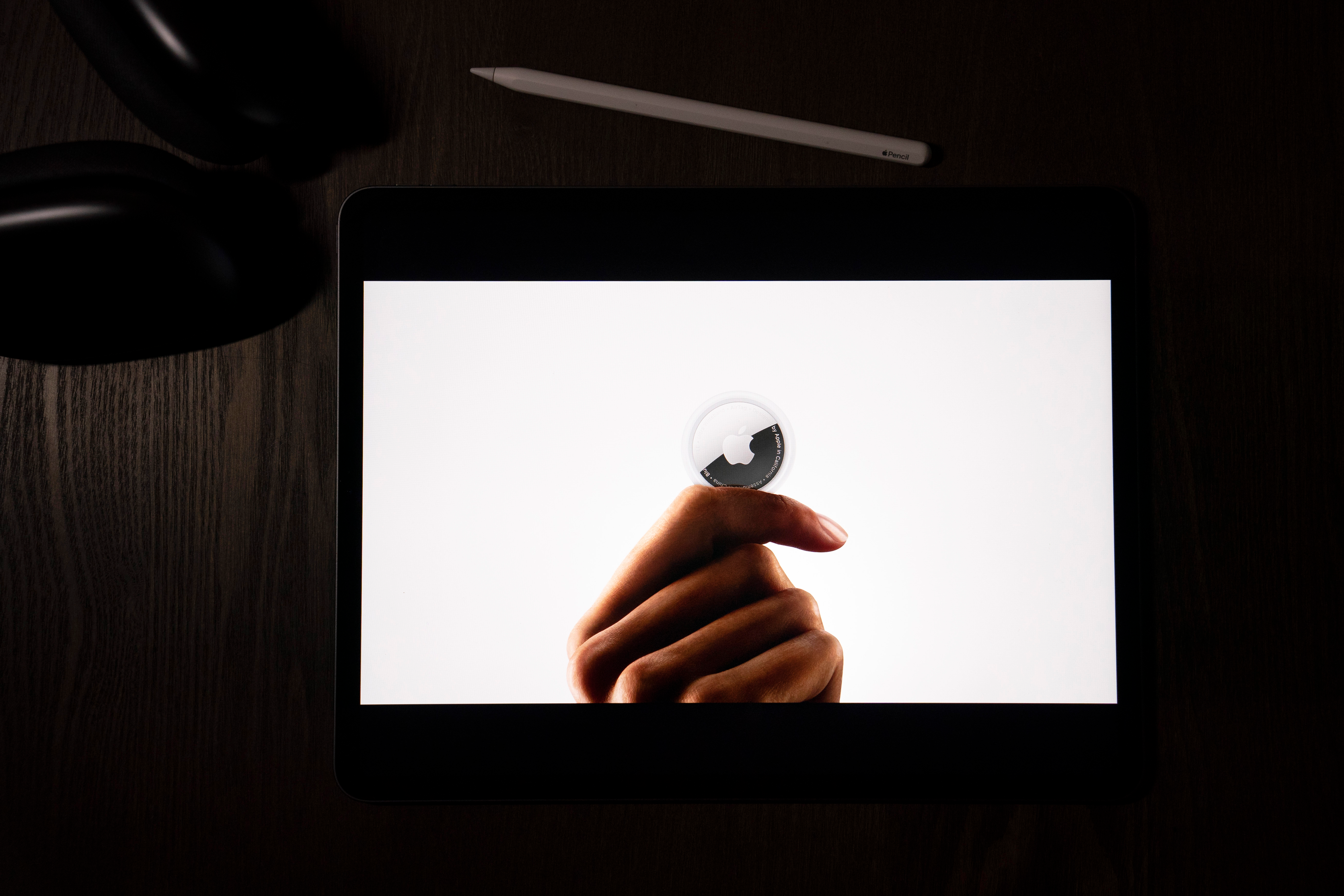 In this illustration photographed in La Habra, Calif., the AirTag tracking device is introduced during a virtual event held to announce new Apple products, Tuesday, April 20, 2021.