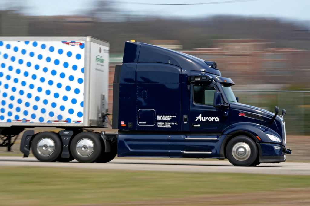 A self-driving tractor trailer maneuvers around a test track in Pittsburgh, Thursday, March 14, 2024. The truck is owned by Pittsburgh-based Aurora Innovation Inc. Late this year, Aurora plans to start hauling freight on Interstate 45 between the Dallas and Houston areas with 20 driverless trucks.