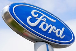 A Ford sign is shown at a dealership in Springfield, Pa., Tuesday, April 26, 2022.