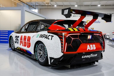 A prototype of the first electric racecar is displayed at the NASCAR R&D Center in Concord, N.C., Monday, July 1, 2024. The top motorsports series in North America partnered with Chevrolet, Ford, Toyota and electrification company ABB to demonstrate a high-performance electric vehicle and gauge fan interest in electric racing.
