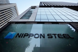 Nippon Steel Corporation's logo is displayed on a sign outside its headquarters in Tokyo on Nov. 26, 2021.