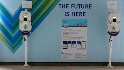 Electric Vehicle charging stations are seen a residential building parking area in Mumbai, India.