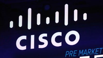The Cisco logo appears on a screen at the Nasdaq MarketSite.