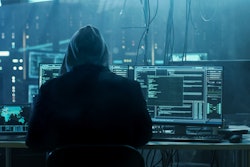 Dangerous Hooded Hacker Breaks Into Government Data Servers And Infects Their System With A Virus His Hideout Place Has Dark Atmosphere, Multiple Displays, Cables Everywhere 817486228 2313x1301 (1)