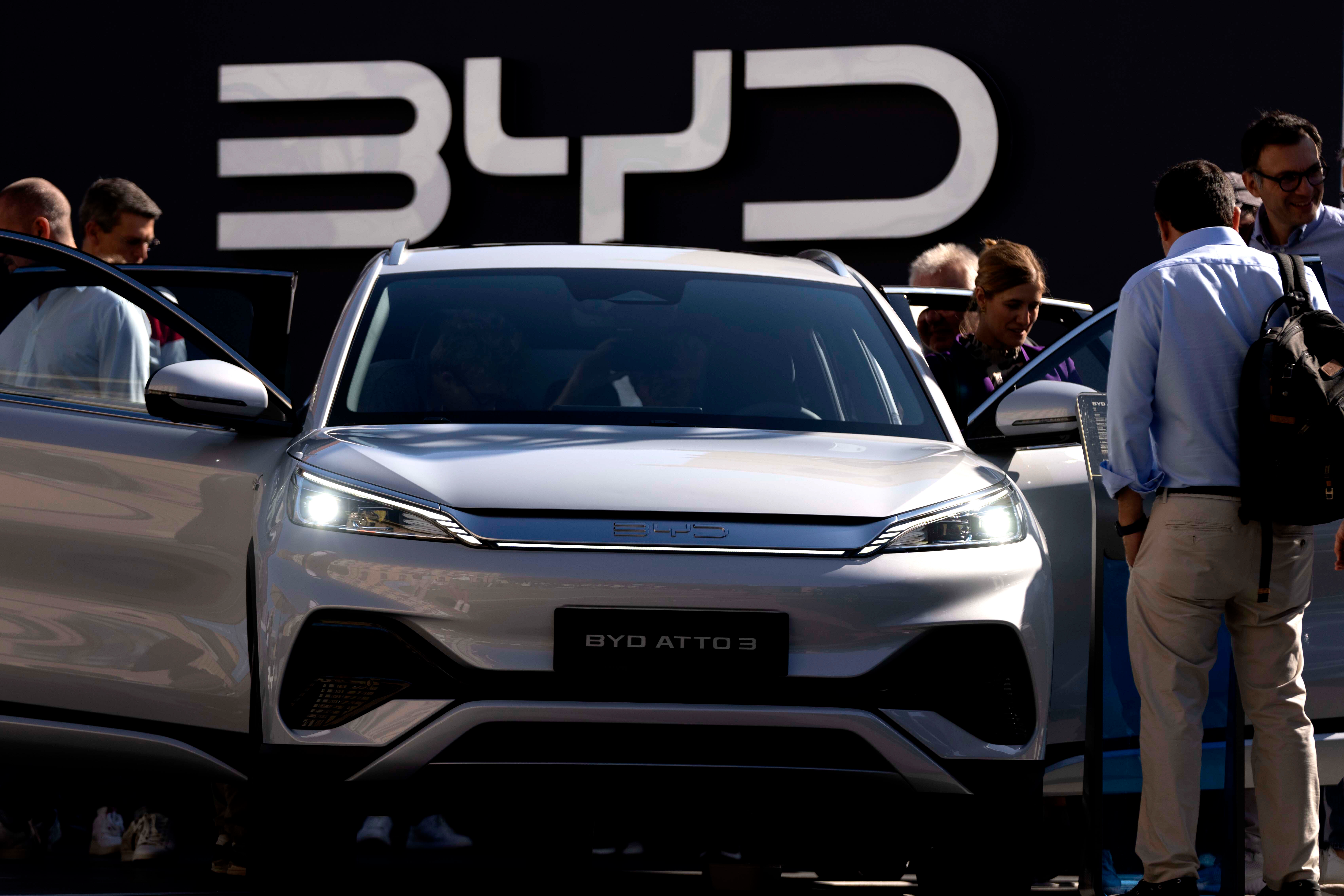 Visitors look at the Chinese made BYD ATTO 3 at the IAA motor show in Munich, Germany, on Sept. 8, 2023.