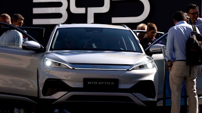 Visitors check the China made BYD ATTO 3 at the IAA motor show in Munich, Germany.