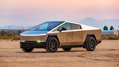This photo provided by Edmunds shows the 2024 Tesla Cybertruck. The Cybertruck can drive more than 300 miles on a full charge and tow up to 11,000 pounds.