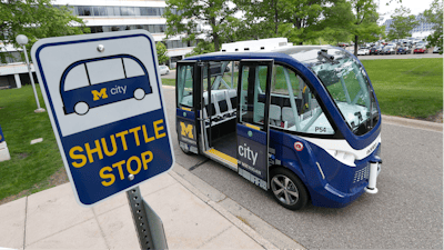 An Mcity driverless shuttle makes a stop on June 4, 2018 at the University of Michigan in Ann Arbor, Mich.