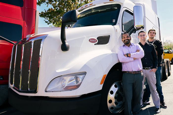 Mechanical and Aerospace Engineering Professor Subith Vasu and students pose with a PACCAR truck that may stand to benefit from Vasu&rsquo;s hydrogen combustion engine research.
