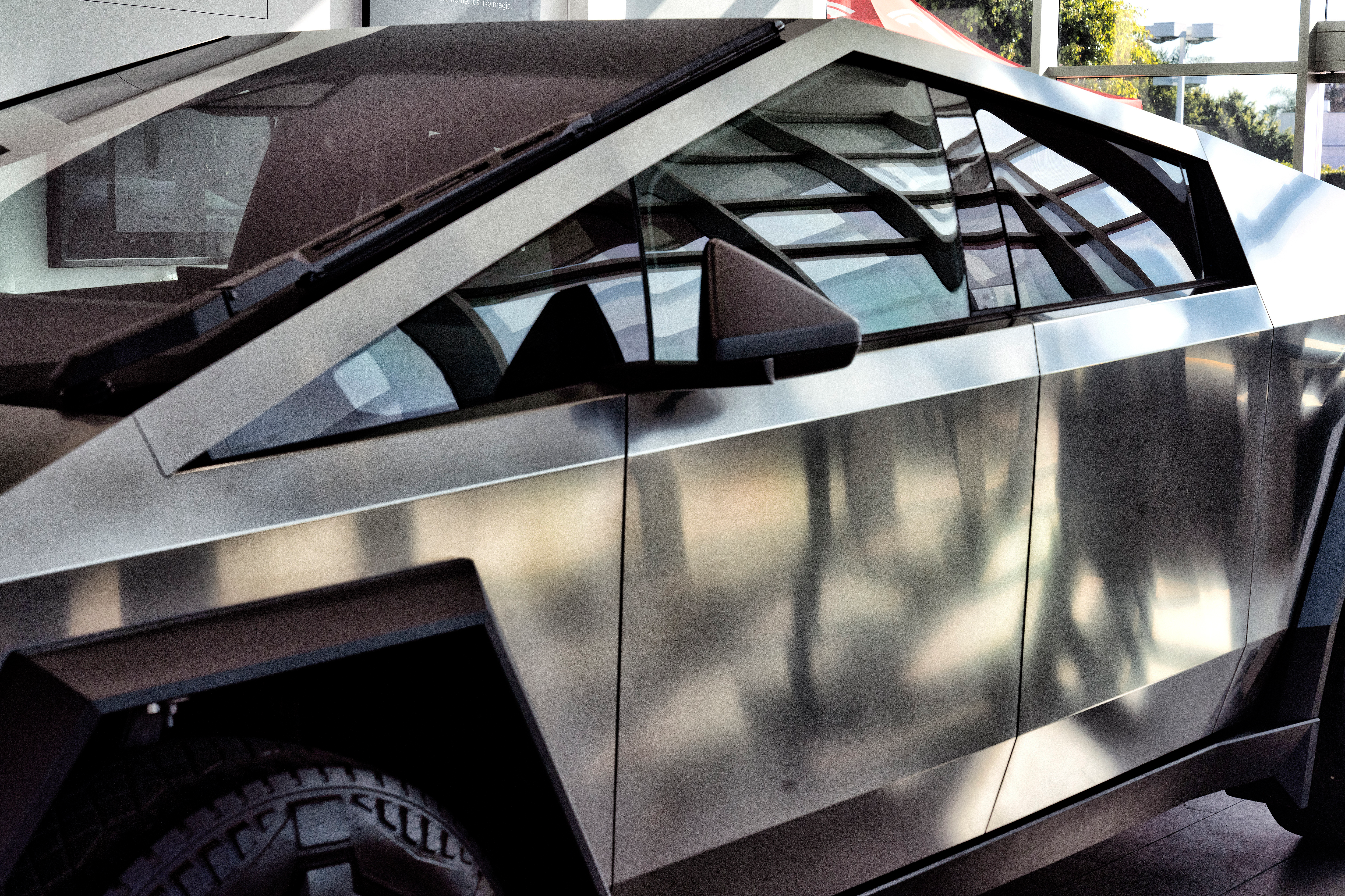 A Tesla Cybertruck is on display at Tesla in Buena Park, Calif., on Sunday, Dec. 3, 2023.