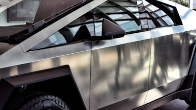 A Tesla Cybertruck is on display at Tesla in Buena Park, Calif., on Sunday, Dec. 3, 2023.