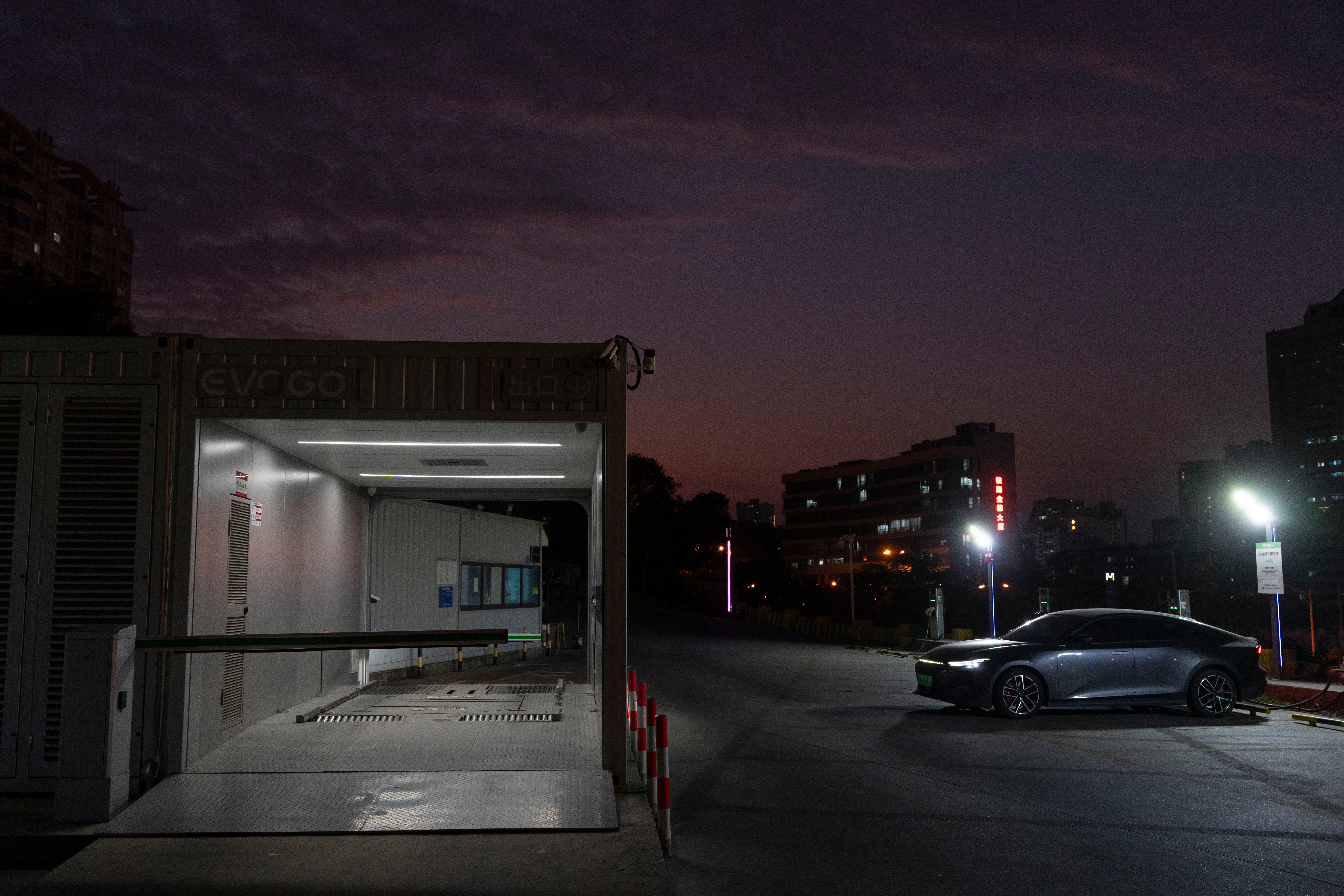 A first generation battery swapping station by China-based CATL battery manufacturing company, is seen in Xiamen, Fujian province, China, Wednesday, Dec. 18, 2024.