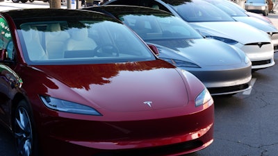 Tesla vehicles are displayed at the AutoMobility LA Auto Show, in Los Angeles, Nov. 21, 2024.