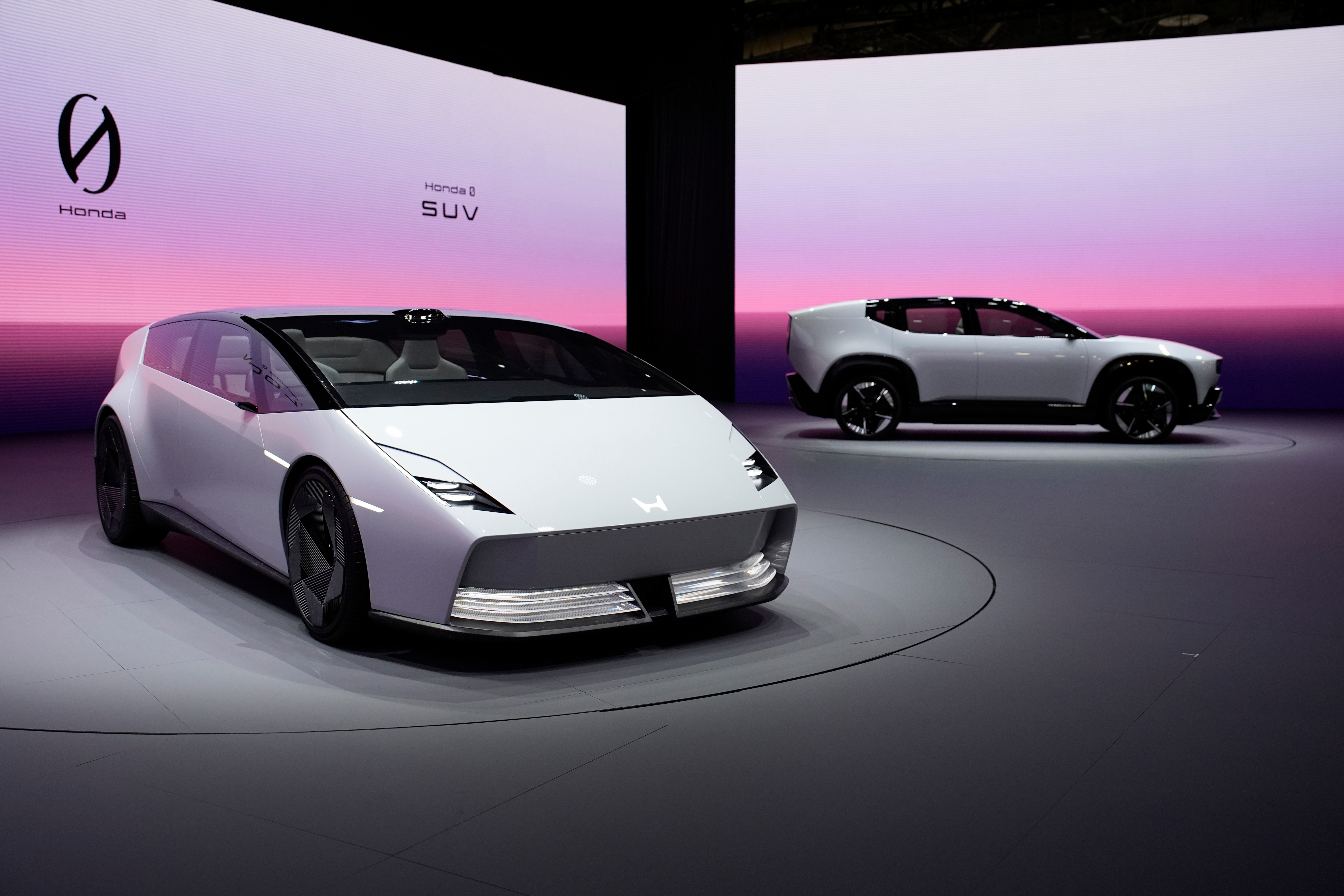 The Honda 0 SUV, right, and Honda 0 Saloon EV prototypes are on display at the Honda booth during the CES tech show Tuesday, Jan. 7, 2025, in Las Vegas.