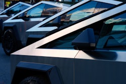 Tesla Cybertrucks are displayed at the AutoMobility LA Auto Show, Nov. 21, 2024, in Los Angeles.