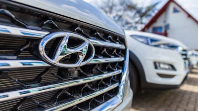 The logo on the grille of a Hyundai vehicle.