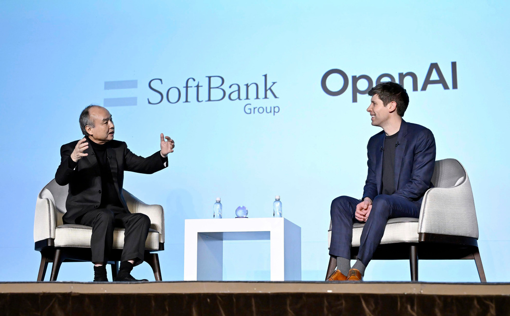 SoftBank Chief Masayoshi Son, left, and OpenAI Chief Sam Altman hold a talk during an event for enterprises in Tokyo, in Tokyo, Monday, Feb. 3, 2025.