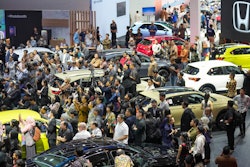 Visitors look at vehicles during the Indonesian International Motor Show in Jakarta, Indonesia, Thursday, Feb. 13, 2025.