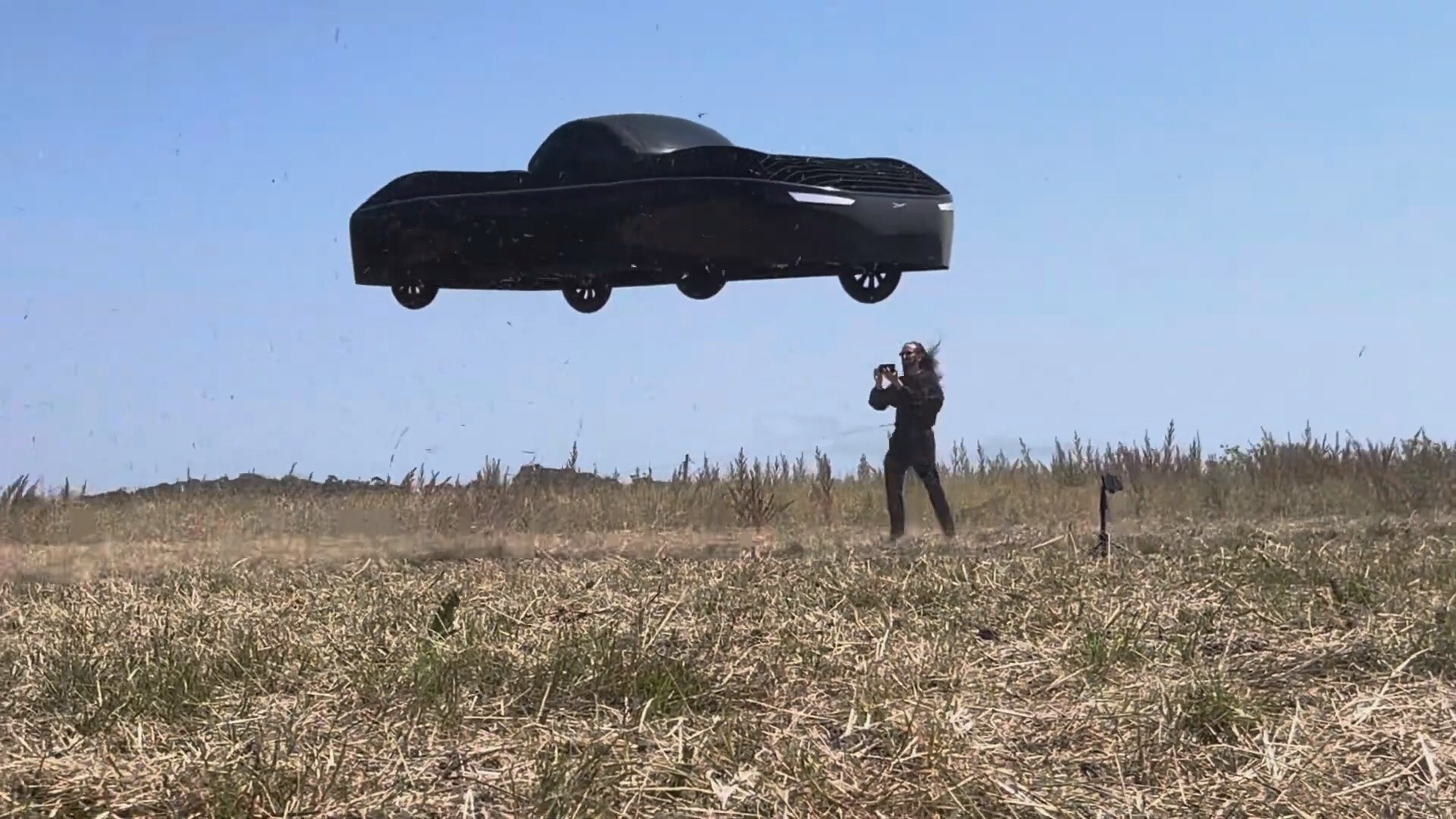Jim Dukhovny CEO of Alef near the flying car during a flight test.