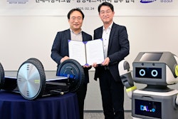 Dong Jin Hyun, VP and head of robotics LAB at Hyundai Motor and Kia (left) and Hans Cho, executive VP and head of strategic marketing at Samsung SDI.