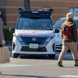 In this photo released by Nissan Motor Corp., its driverless vehicle, center, drives along a street in Yokohama, near Tokyo in February 2025.