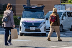 In this photo released by Nissan Motor Corp., its driverless vehicle, center, drives along a street in Yokohama, near Tokyo in February 2025.