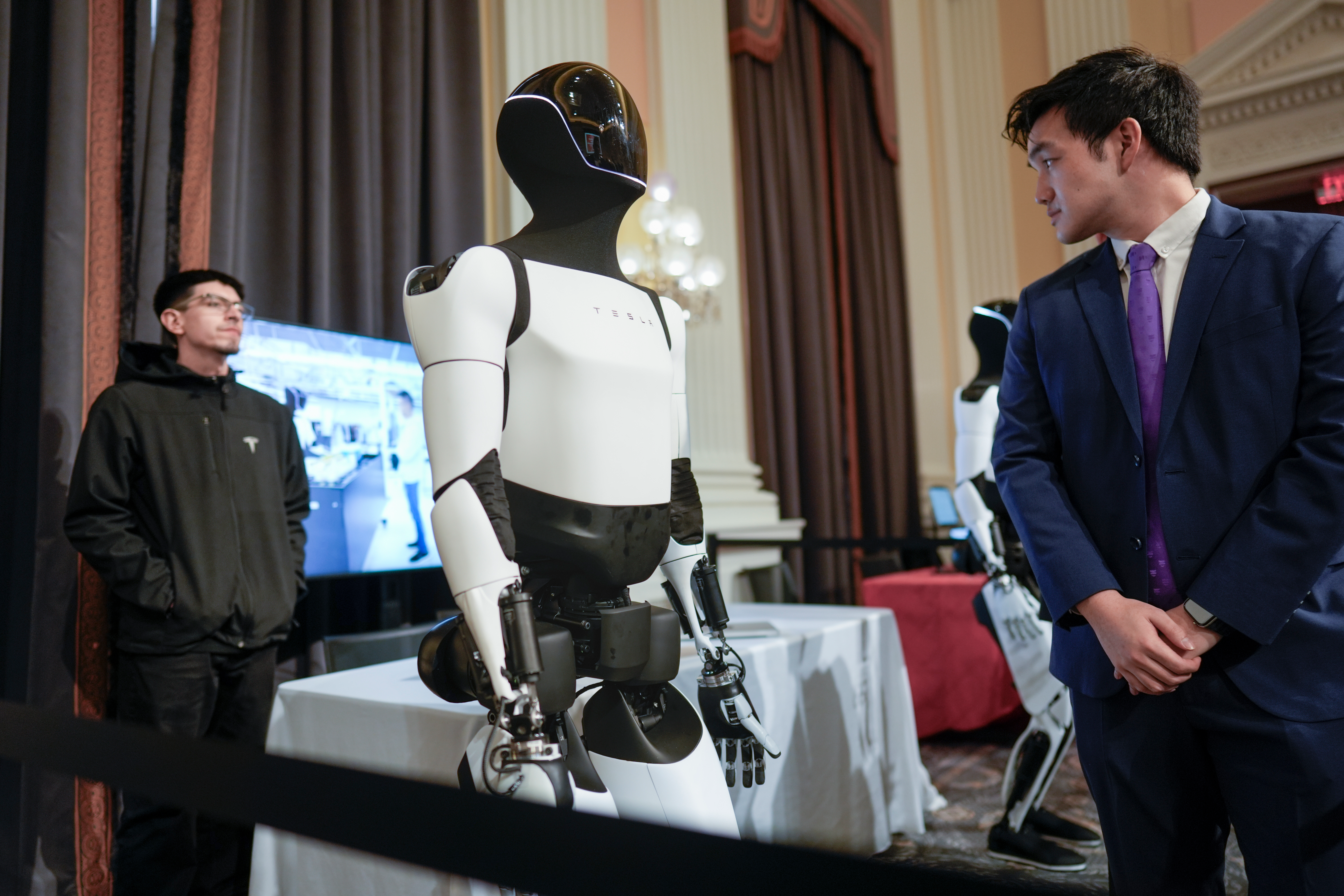 A Tesla robot is displayed as U.S. robotics companies look for congressional support to compete with Chinese companies, on Capitol Hill in Washington, Wednesday, March 26, 2025.