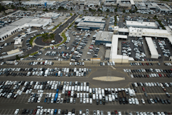 An aerial view shows auto dealerships in Cerritos, Calif., Thursday, March 27, 2025.
