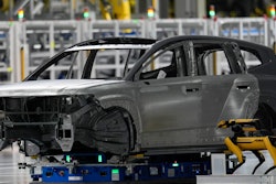 A Boston Dynamics robot works on the line during a media tour at the Hyundai Motor Group Metaplant America, Wednesday, March 26, 2025, in Ellabell, Ga.