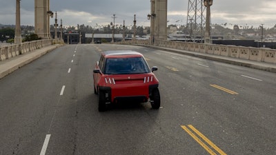 Telo Trucks drives across the 4th Street Bridge in Los Angeles, California.
