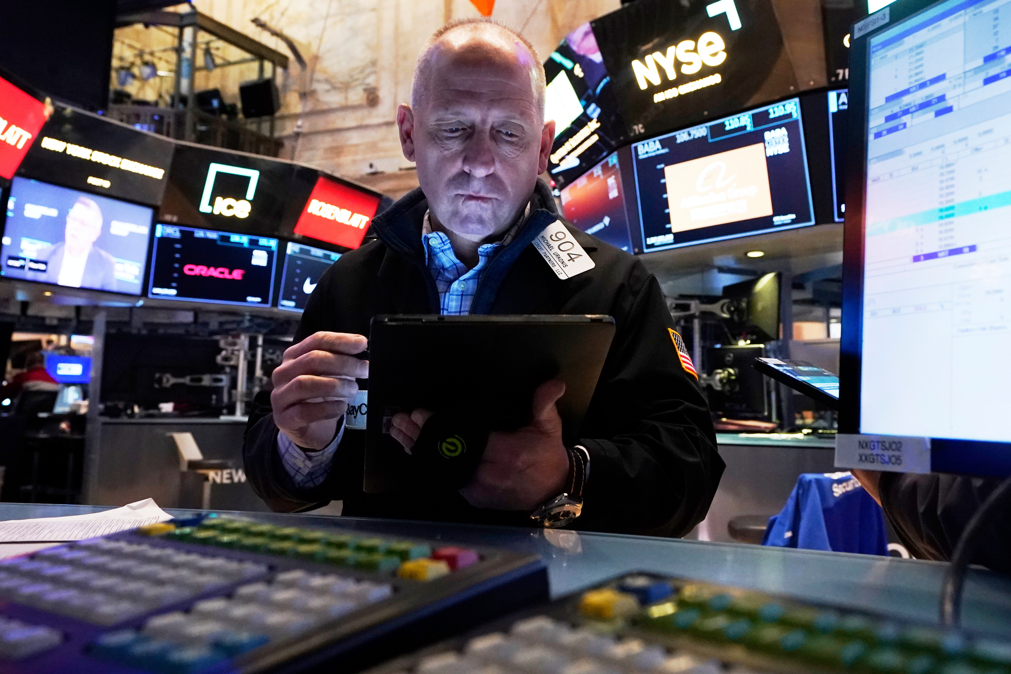 Trader Michael Urkonis works on the floor of the New York Stock Exchange, Thursday, April 17, 2025.