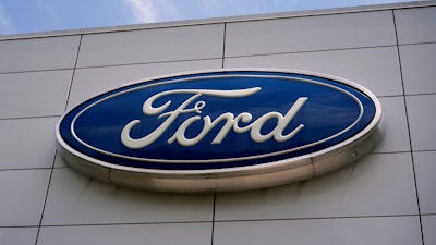 The Ford logo is seen above the entrance to the Ford Motor Company Kentucky Truck Plant, Wednesday, April 30, 2025, in Louisville, Ky.