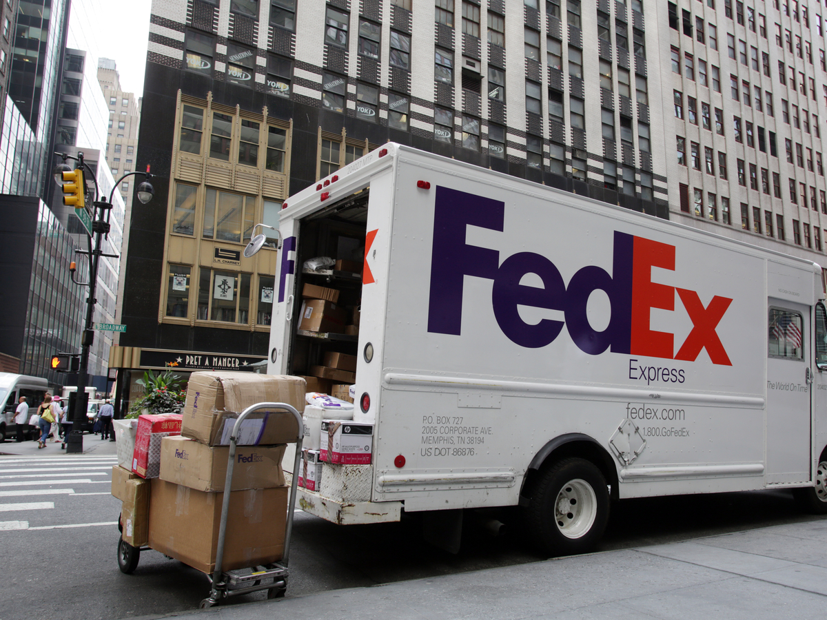 Packages are unloaded from a FedEx Corp. truck in New York City. Photo: Shutterstock.