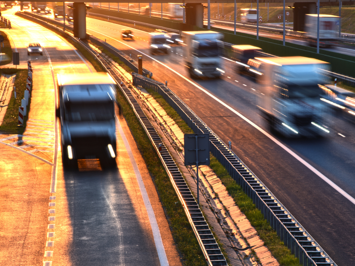 Trucks on a busy highway.