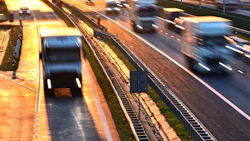 Trucks on a busy highway.