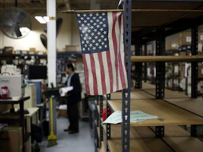 A U.S. flag is displayed on a factory floor in Bowling Green, Kentucky. Photo: Bloomberg.