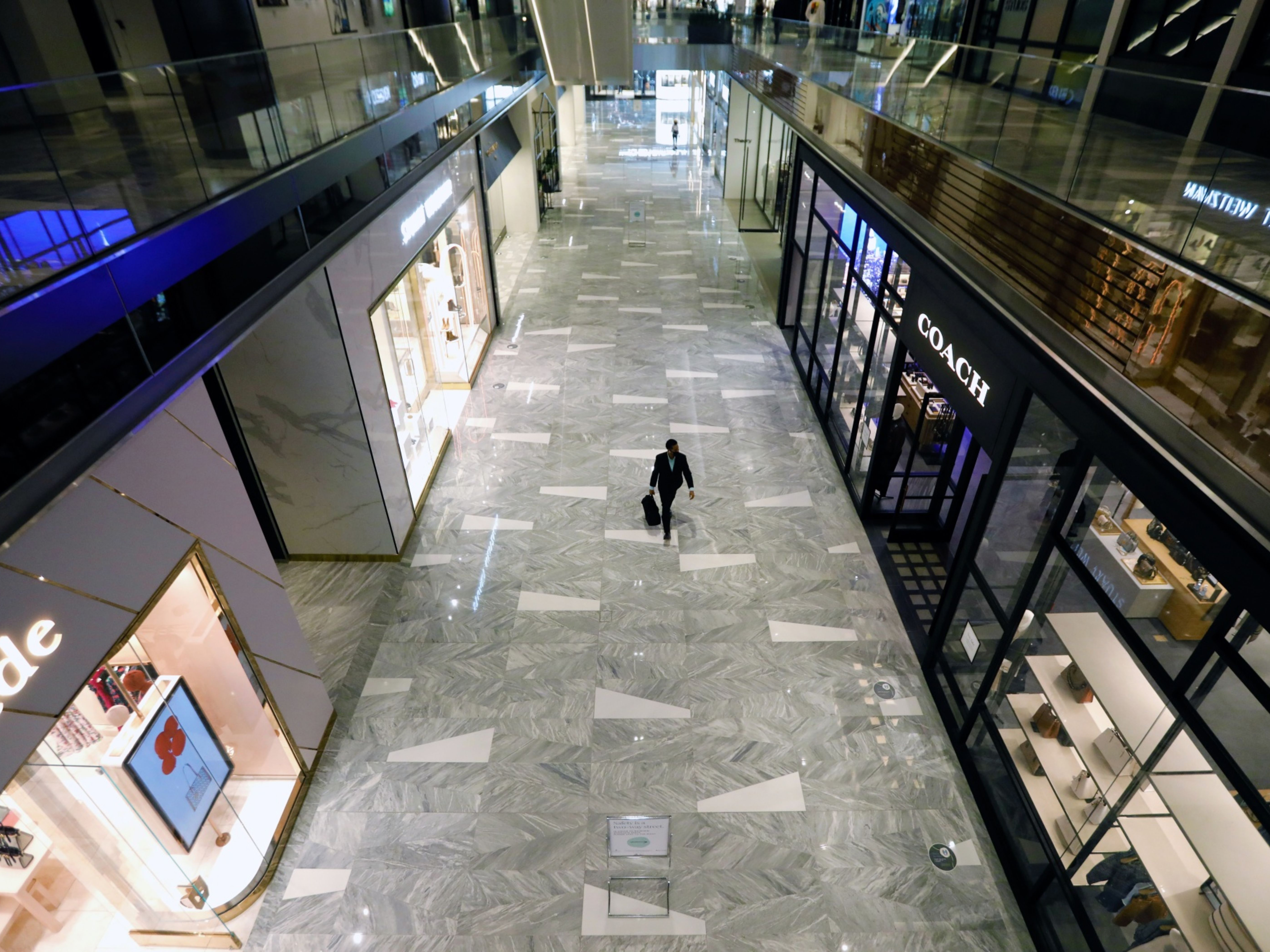 A shopper walks through Hudson Yards mall in New York. Photo: Bloomberg.
