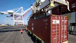 A truck stops at the Port of Long Beach. Photo: Bloomberg.