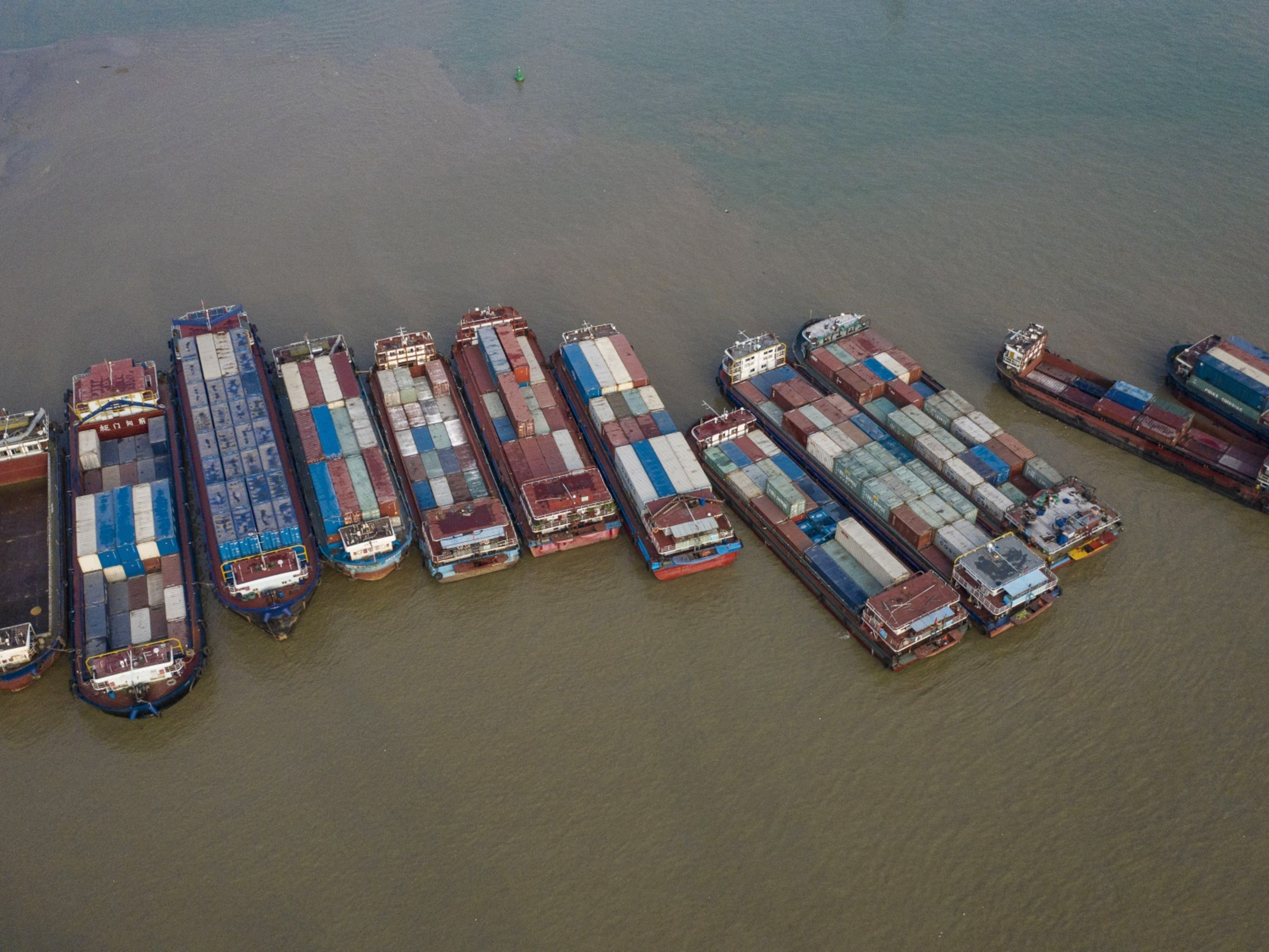 Container ships are moored near the Port of Nansha in Guangzhou, China. Photo: Bloomberg.