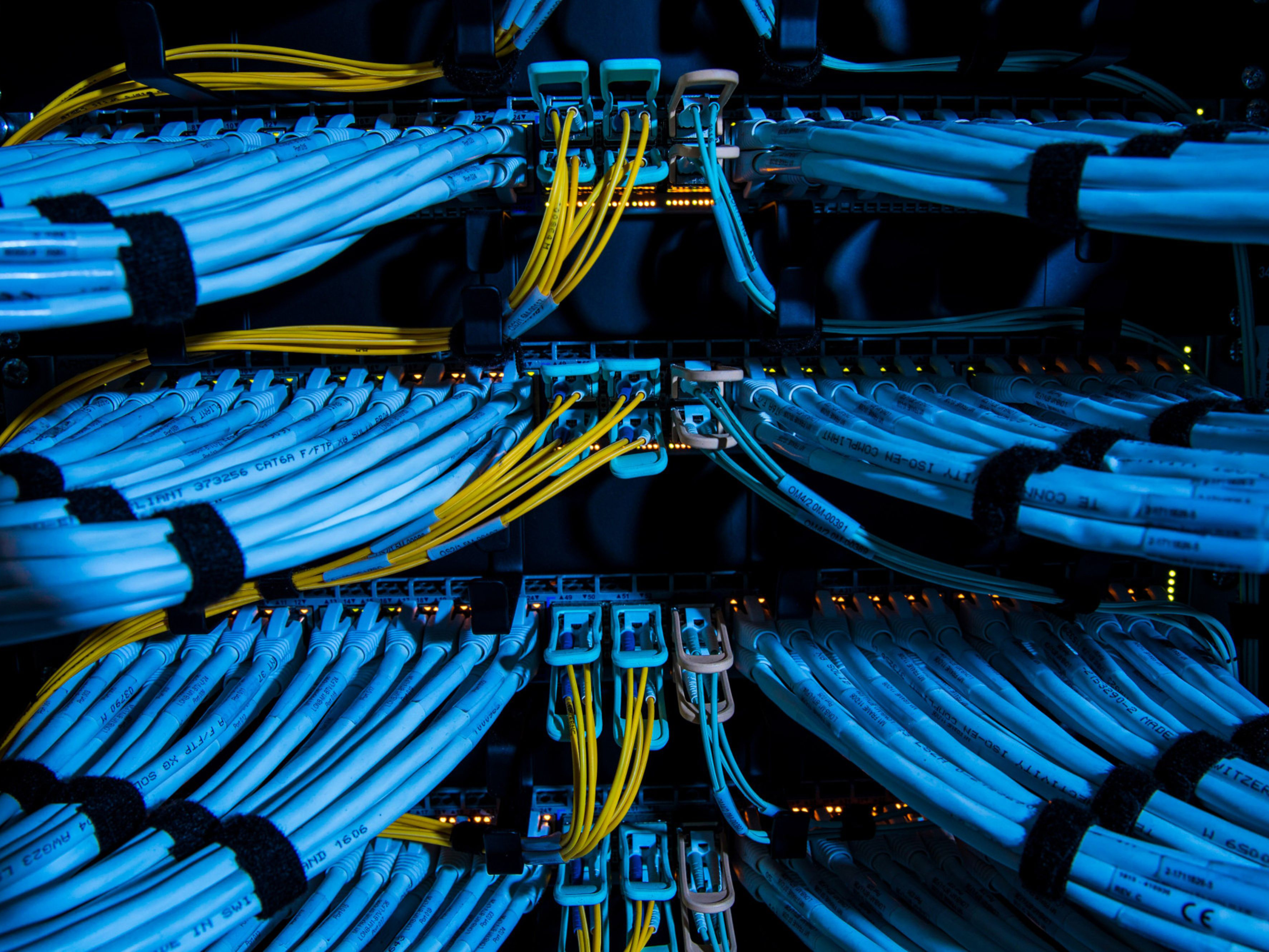 Data cables feed into servers. Photo: Bloomberg.