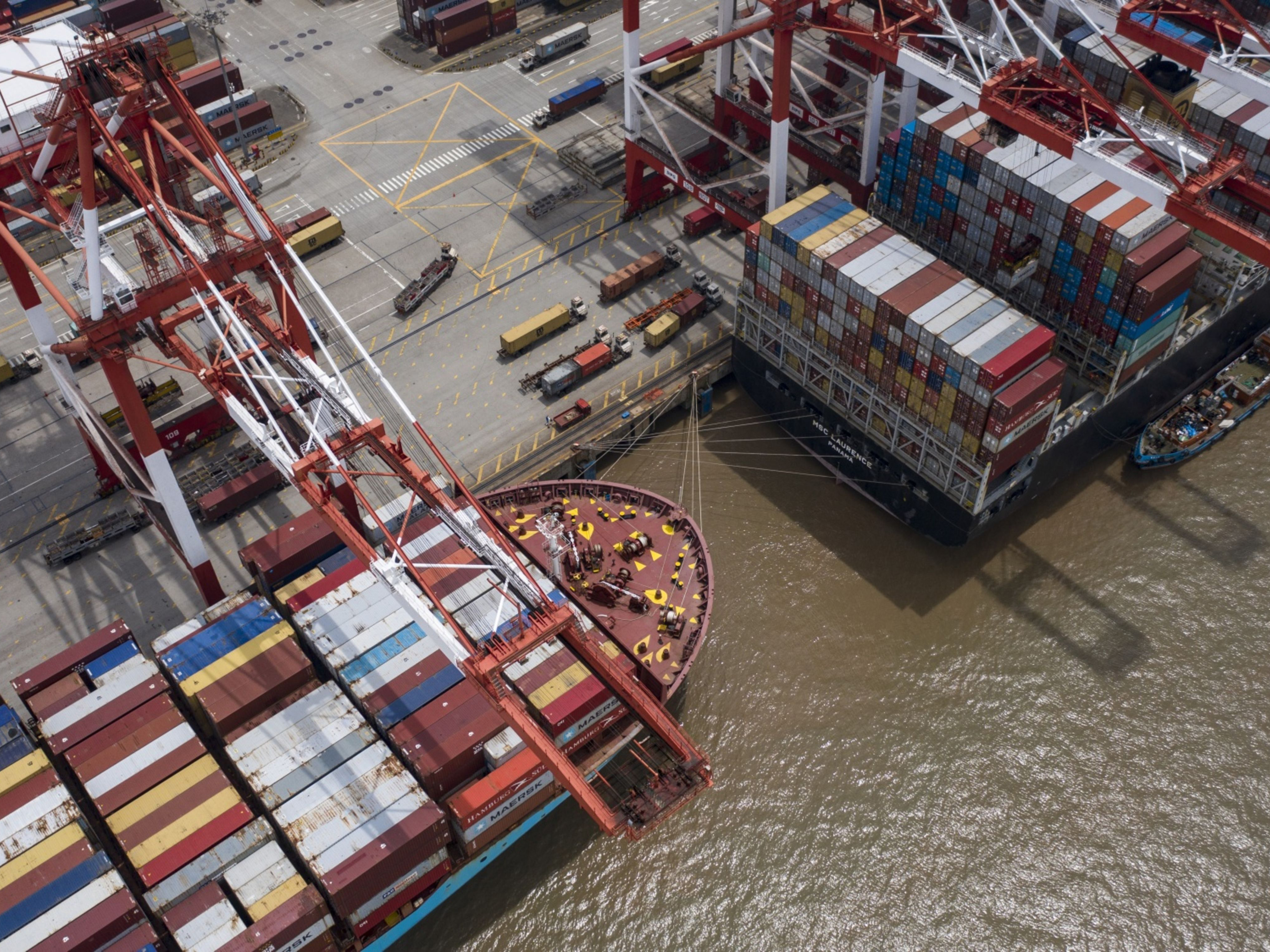 Vessels loaded with shipping containers are docked at the Yangshan Deepwater Port in Shanghai, China. Photo: Bloomberg.