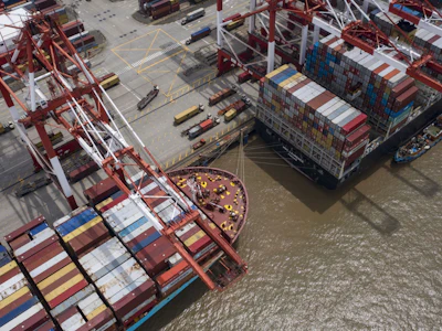 Vessels loaded with shipping containers are docked at the Yangshan Deepwater Port in Shanghai, China. Photo: Bloomberg.