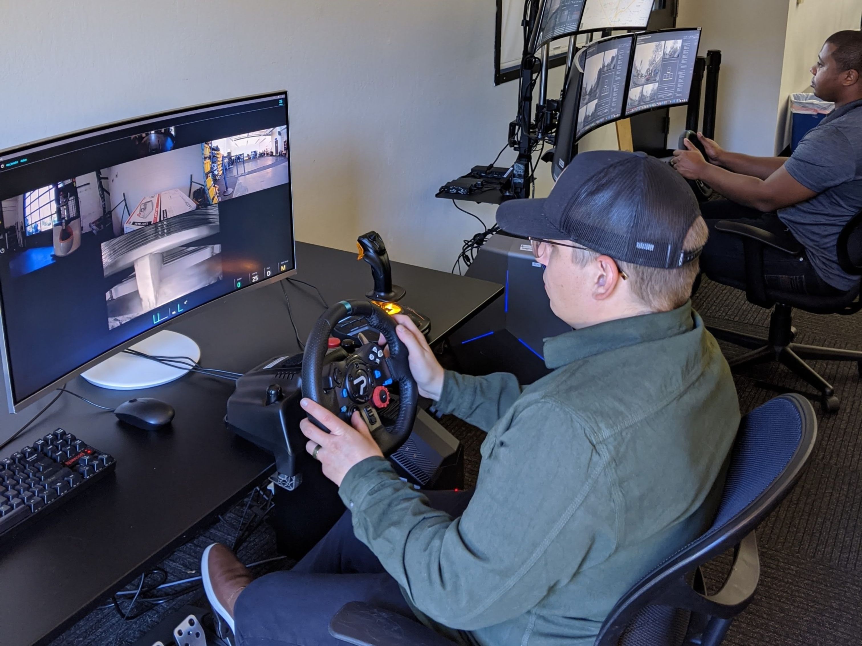 A driver operates a forklift remotely. Photo: Bloomberg.